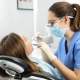 Dentist examining a patient teeth