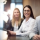 Young businesswoman holding tablet in conference room